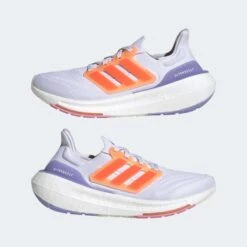 ADIDAS Women's Ultraboost Light Running Shoe - Ftwr White/Solar Red/Beam Pink - Regular (B) -Optimal Shoe Store 01bf57a00c1544999684af9c01358231 9366