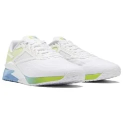 Reebok Women's Nano X2 Training Shoe - Ftwr White/Essential Blue/Acid Yellow - Regular (B) -Optimal Shoe Store 2 540x 734eab64 92eb 46bc b53d 906f5684978f