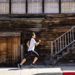 Topo Athletic Women's Ultrafly 4 Running Shoe - Black/White- Regular (B) -Optimal Shoe Store W056.Black White 10